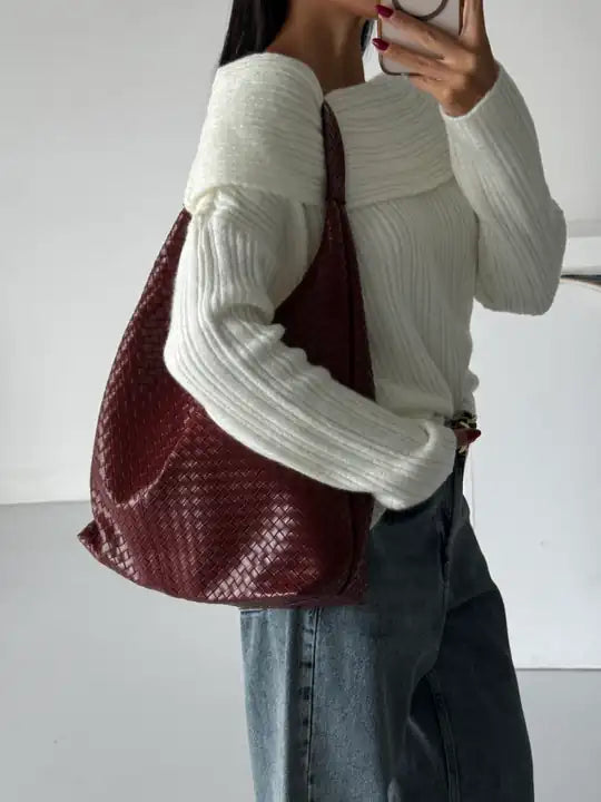 شنتة كتف جلد مبزر